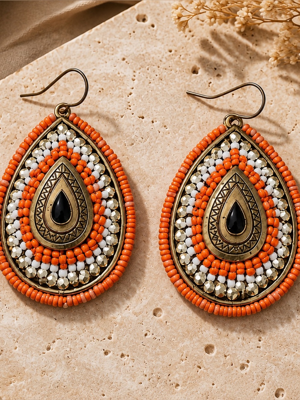Oversized orange, white, gold  and bronze colored earrings EUC